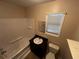 Clean bathroom with tub, toilet and vanity at 3246 Wallace Lake Rd, Douglasville, GA 30135