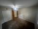 Spacious bedroom with double door closet and ceiling fan at 3246 Wallace Lake Rd, Douglasville, GA 30135