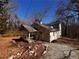 Ranch house with a wraparound porch and a large backyard at 3246 Wallace Lake Rd, Douglasville, GA 30135