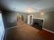 Living room with fireplace, hardwood floors and neutral walls at 3246 Wallace Lake Rd, Douglasville, GA 30135