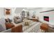 Cozy living room featuring stylish furniture, accent pillows, and fireplace at 5507 Flat Shoals Pkwy, Decatur, GA 30034