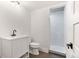 Bathroom with white vanity, toilet and shower at 1240 Spalding Dr, Sandy Springs, GA 30350