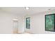 Bright bedroom with hardwood floors and large windows at 1240 Spalding Dr, Sandy Springs, GA 30350