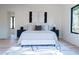 Bright bedroom with light walls, hardwood floors, and large windows at 1240 Spalding Dr, Sandy Springs, GA 30350