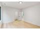Spacious bedroom with hardwood floors and access to a bathroom at 1240 Spalding Dr, Sandy Springs, GA 30350