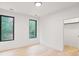Bright bedroom with hardwood floors and large windows at 1240 Spalding Dr, Sandy Springs, GA 30350
