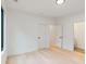 Bright bedroom with hardwood floors and two doors at 1240 Spalding Dr, Sandy Springs, GA 30350