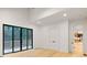 Light and airy bedroom with access to kitchen and deck at 1240 Spalding Dr, Sandy Springs, GA 30350