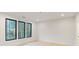 Bright bedroom featuring hardwood floors and large windows at 1240 Spalding Dr, Sandy Springs, GA 30350