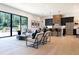 Open floor plan with modern kitchen, breakfast bar, and spacious living area at 1240 Spalding Dr, Sandy Springs, GA 30350