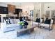 Light and airy living room with comfortable seating and large windows at 1240 Spalding Dr, Sandy Springs, GA 30350