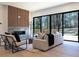 Living room features a modern fireplace and sliding glass doors to backyard at 1240 Spalding Dr, Sandy Springs, GA 30350
