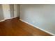 Hardwood floor bedroom with neutral walls and closets at 1943 Glenmar Dr, Decatur, GA 30032