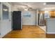 Bright dining area with hardwood floors and stainless steel appliances at 1943 Glenmar Dr, Decatur, GA 30032