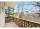 Outdoor balcony area with wooded surroundings at 1350 Eryn Cir, Suwanee, GA 30024