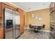 Eat in kitchen features stainless steel appliances, granite countertops, and breakfast table at 1350 Eryn Cir, Suwanee, GA 30024