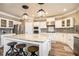 Modern kitchen with a large island, stainless steel appliances, and ample cabinet space at 1350 Eryn Cir, Suwanee, GA 30024