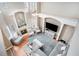 Spacious living area features high ceilings, fireplace, and connects to the kitchen and dining at 1350 Eryn Cir, Suwanee, GA 30024