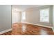 Bright bedroom with wood floors, fresh paint, a closet, and natural light at 884 Custer Se Ave, Atlanta, GA 30316