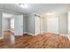 Spacious bedroom featuring wood floors, fresh paint, and two closets at 884 Custer Se Ave, Atlanta, GA 30316
