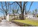 Inviting single-Gathering home with a charming stone retaining wall and mature trees in the front yard at 884 Custer Se Ave, Atlanta, GA 30316