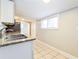 Bright kitchen featuring granite counters, stainless steel appliances, and crisp white cabinetry at 884 Custer Se Ave, Atlanta, GA 30316