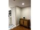 Basement storage area with white closet doors and wood cabinet at 18 Ivy Ne Rdg, Atlanta, GA 30342