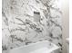 Bathroom with marble-tiled shower and bathtub at 18 Ivy Ne Rdg, Atlanta, GA 30342