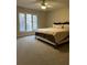 Spacious bedroom with large windows and plush carpeting at 18 Ivy Ne Rdg, Atlanta, GA 30342