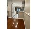 Modern kitchen with hardwood floors and peninsula at 18 Ivy Ne Rdg, Atlanta, GA 30342