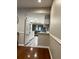 Modern kitchen features stainless steel appliances and hexagon tile flooring at 18 Ivy Ne Rdg, Atlanta, GA 30342