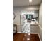 Modern kitchen features stainless steel appliances and hexagon tile flooring at 18 Ivy Ne Rdg, Atlanta, GA 30342