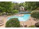 Community pool with plenty of lounge chairs at 18 Ivy Ne Rdg, Atlanta, GA 30342