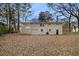 Brick home with garage and large backyard, wooded area at 5531 Wild Cherry Sw Dr, Mableton, GA 30126