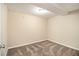 Finished basement room with neutral walls and carpet at 5531 Wild Cherry Sw Dr, Mableton, GA 30126