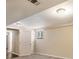 Finished basement with neutral walls and carpet flooring at 5531 Wild Cherry Sw Dr, Mableton, GA 30126