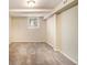 Spacious basement room with neutral walls and carpet at 5531 Wild Cherry Sw Dr, Mableton, GA 30126