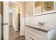 Updated bathroom with white vanity, granite countertop and subway tile at 5531 Wild Cherry Sw Dr, Mableton, GA 30126