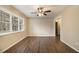 Bright living room with hardwood floors and ceiling fan at 5531 Wild Cherry Sw Dr, Mableton, GA 30126