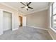 Spacious bedroom with large closet and window at 630 Eagles Lndg, Woodstock, GA 30188