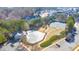 Aerial view of community amenities including pool, playground, and tennis courts at 630 Eagles Lndg, Woodstock, GA 30188