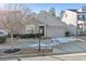 Gray siding house with brick accents and a two-car garage at 630 Eagles Lndg, Woodstock, GA 30188