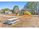 playground with slides, climbing structures, and swings at 630 Eagles Lndg, Woodstock, GA 30188