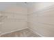 Walk-in closet with wire shelving and carpet flooring at 2907 Wickford Nw Dr, Kennesaw, GA 30152