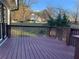 Spacious wooden deck with beautiful backyard view on a sunny day at 2907 Wickford Nw Dr, Kennesaw, GA 30152