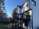 Exterior view of a deck with stairs leading to the backyard on a sunny day at 2907 Wickford Nw Dr, Kennesaw, GA 30152