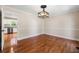 Bright dining room with hardwood floors and a view into the kitchen at 2907 Wickford Nw Dr, Kennesaw, GA 30152