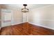 Spacious dining room with hardwood floors and neutral walls at 2907 Wickford Nw Dr, Kennesaw, GA 30152