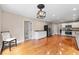 Open kitchen featuring hardwood floors and stainless steel appliances at 2907 Wickford Nw Dr, Kennesaw, GA 30152