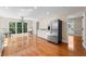 Kitchen with stainless steel appliances, hardwood floors, and a breakfast area at 2907 Wickford Nw Dr, Kennesaw, GA 30152